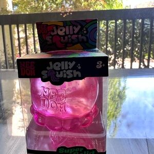 NEW NeeDoh Jolly Squish Pink Stress Ball Toy